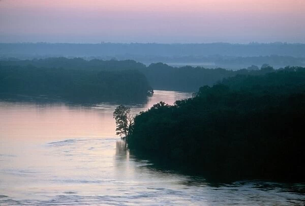 MISSISSIPPI RIVER: BLUFFS. Bluffs overlooking the Mississippi River, viewed at sunrise from Riverview Park in Hannibal, Missouri. Photographed c1974
