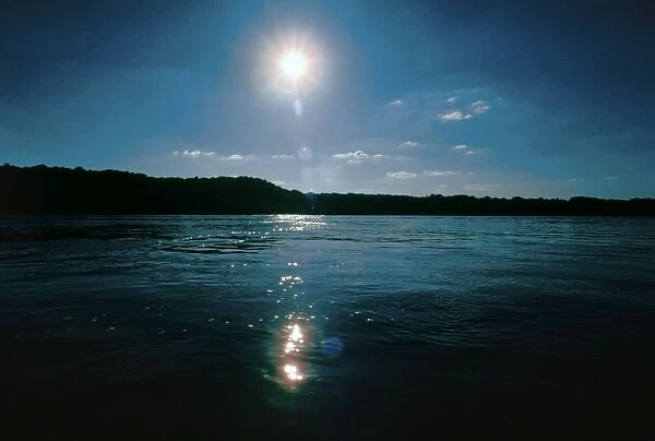 MISSISSIPPI RIVER: SUNRISE. Sunrise over the Mississippi River, Hannibal, Missouri. Photographed c1974