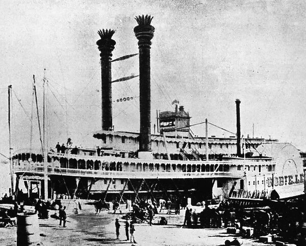 MISSISSIPPI STEAMBOAT, c1870. The steamboat Robert E. Lee docked along the Mississippi River