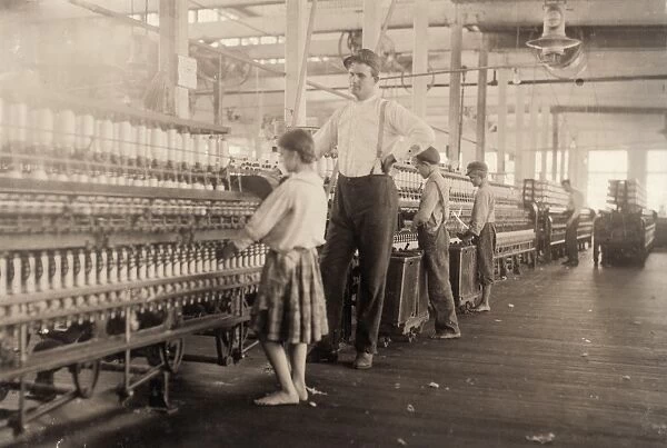 MISSISSIPPI: YARN MILL. A young spinner at a yarn mill in Yazoo City, Mississippi