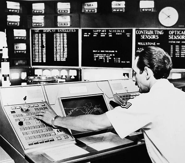 Monitoring tracking information on Skylab, the U. S. space station, from the North American Air Defense Command (NORAD) in Colorado Springs, Colorado. Photographed 1979