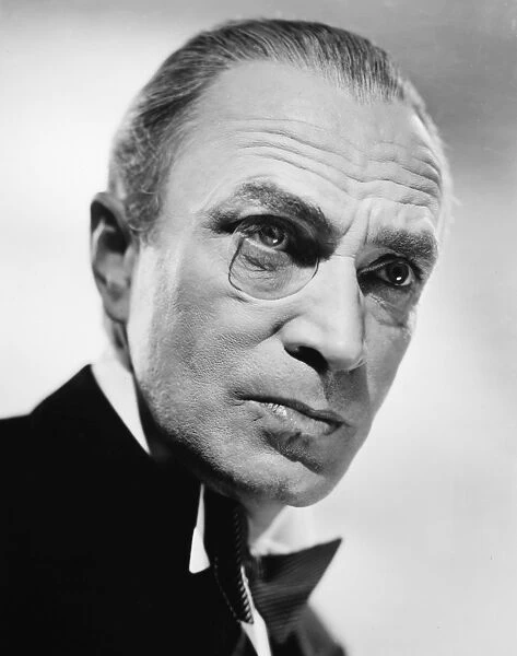 MONOCLE, 1940s. Publicity photograph, probably of the German actor Conrad Veidt wearing a monocle, c1940s