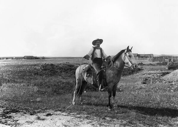 MONTANA: COWBOY, 1890. E. W. Brewster, a cowboy in Mingusville (now Wibaux), Montana