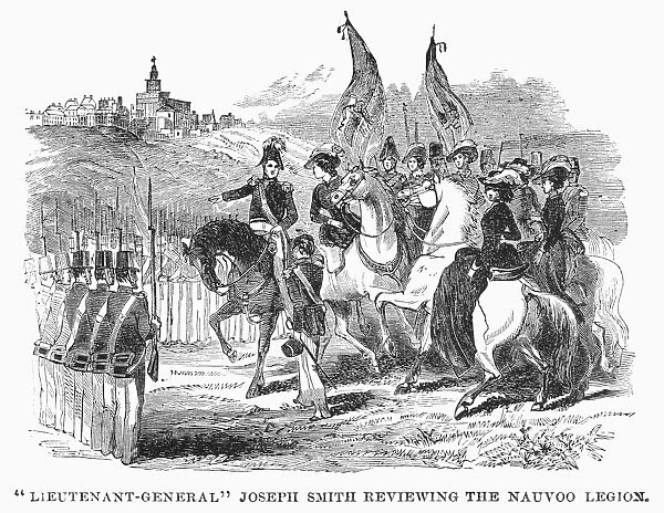 MORMONS AT NAUVOO, 1840s. Joseph Smith reviewing the Nauvoo Legion, the militia unit at the Mormon settlement at Nauvoo, Illinois, early 1840s. Wood engraving, American, 1853
