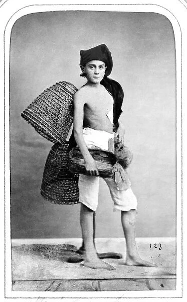 NAPLES: FISHER BOY, 1869. A peasant fisher boy of Naples, Italy. Photograph, 1869