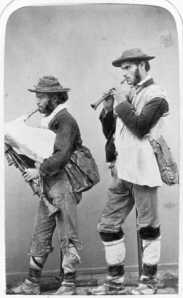 NAPLES: PEASANT, 1869. A pair of peasants of Naples, Italy playing bagpipes. Photograph