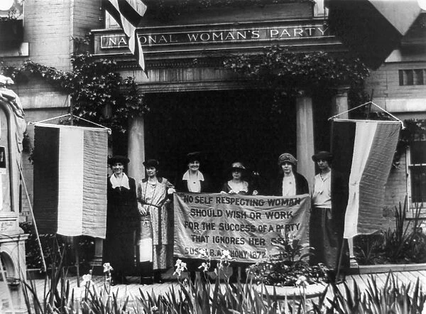 NATIONAL WOMENs PARTY. Alice Paul with officers of the National Womens Party, holding a banner with a quote by Susan B. Anthony in front of their Washington, D. C. headquarters, 1920s. Pictured are Sue White, Mrs. Benigna Green Kalb, Mrs. James Rector, Mary Dubrow and Elizabeth Kalb