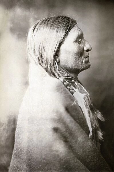 NATIVE AMERICAN MAN, c1904. Old Geronimo Catcher, a Native American man. Photographed by Edward S