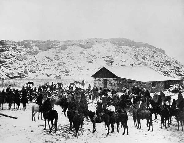 NAVAJO ON HORSEBACK, c1890. A group of Navajo Native Americans on horseback in winter