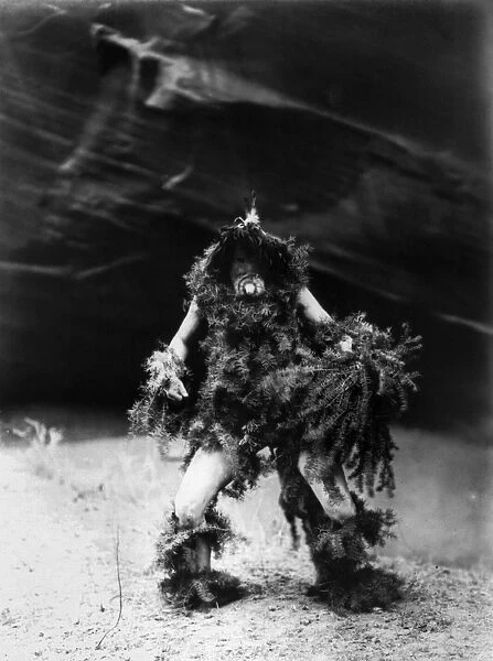 NAVAJO RITUAL, c1905. Navajo man dressed in hemlock boughs and mask associated with