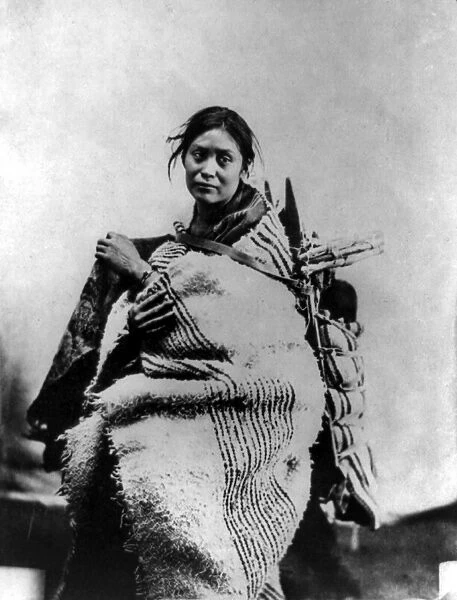 NAVAJO WOMAN & CHILD, c1866. A Navajo woman with an infant on her back. Photograph by John Gaw Meem, c1866