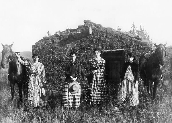 NEBRASKA: SETTLERS, 1886. The Chrisman Sisters in front of a sod house in Goheen Valley