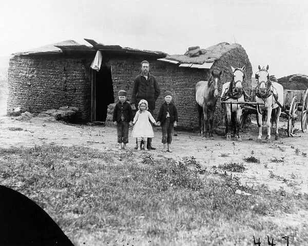 NEBRASKA: SETTLERS, 1887. Homesteader George Barnes and his children in front of