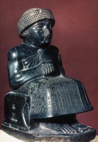 NEO-SUMERIAN PRINCE GUDEA. Diorite statuette of Gudea, Prince of Lagash, c2150 B. C