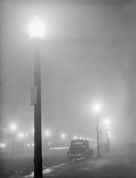 NEW BEDFORD, 1941. A foggy night in New Bedford, Massachusetts. Photograph by Jack Delano, January 1941