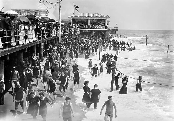 NEW JERSEY: ASBURY PARK. Sunday crowds on the boardwalk and beach at Asbury Park, New Jersey