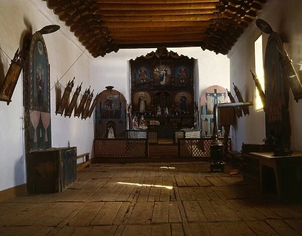 NEW MEXICO: CHURCH, 1943. The interior of a Catholic church in Trampas, New Mexico