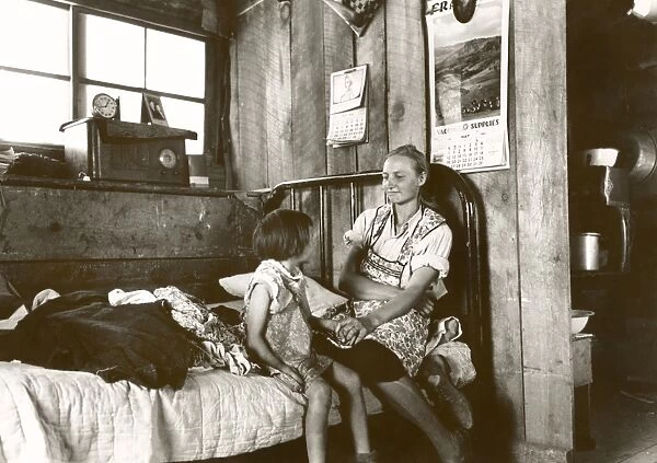 NEW MEXICO: HOME, 1940. Mrs. Caudill and her daughter in their dugout in Pie Town, New Mexico