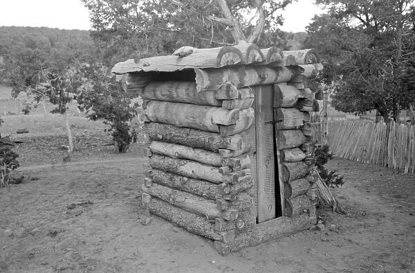 NEW MEXICO: HOUSE, 1940. A log privy on a homesteaders property in Pie Town, New Mexico