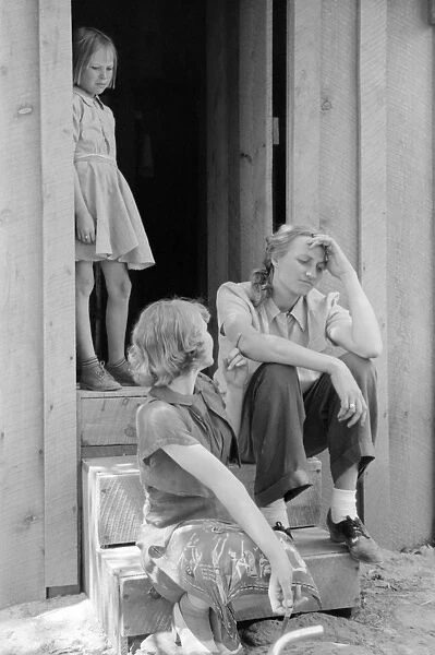 NEW MEXICO: WOMEN, 1940. Women sitting on steps in Pie Town, New Mexico