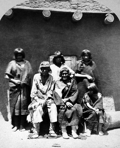 NEW MEXICO: ZUNIS, 1873. Group of young and elderly Zuni Native Americans at a