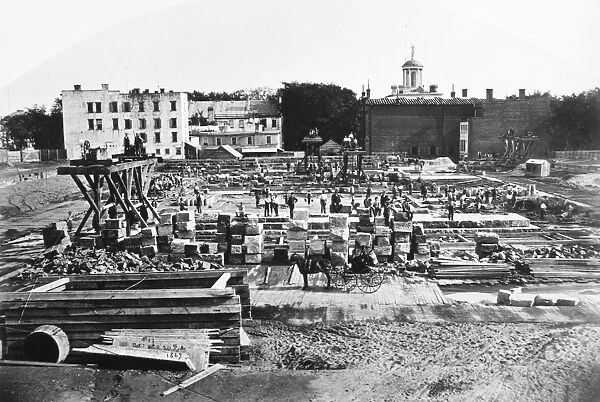 NEW YORK: ALBANY, 1869. Laying granite blocks for the foundation of the new state