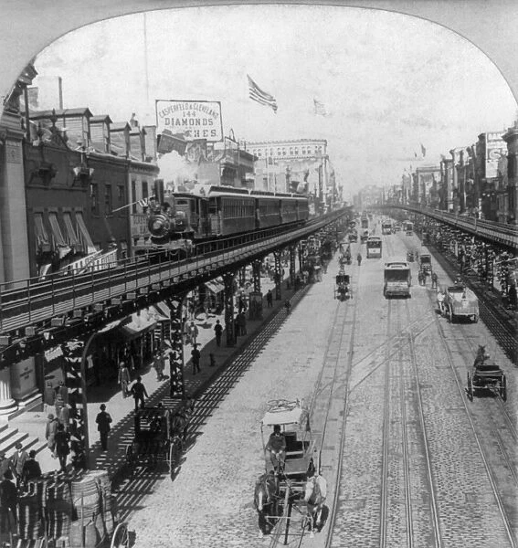 NEW YORK: THE BOWERY. View of street showing an elevated railroad in The Bowery, New York