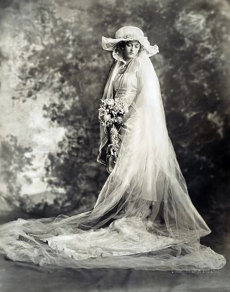 NEW YORK: BRIDE, 1920. Marion Davies photographed in her wedding gown, New York City, c1920