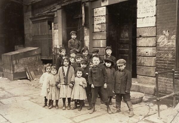 NEW YORK: CHILDREN, 1910. Children posing in front of 36 Laight Street, New York City