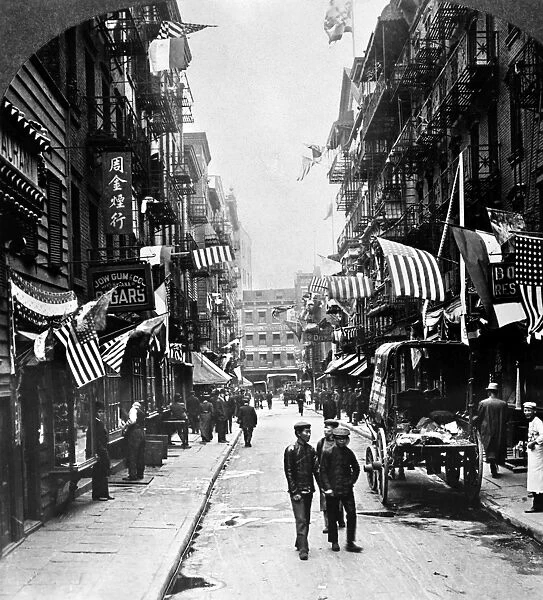 NEW YORK : CHINATOWN, 1909. Doyers Street in New Yorks Chinatown in lower Manhattan. Stereograph, 1909