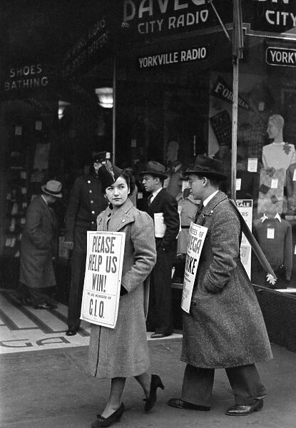 NEW YORK CITY: PICKET, 1937. Striking picketers in New York City. Photograph by Arthur Rothstein