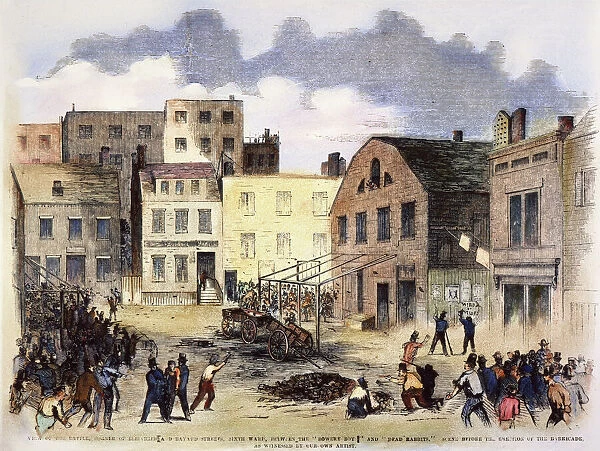 NEW YORK GANG WAR, 1857. Battle between the Bowery Boys and the Dead Rabbits, two New York gangs, at the corner of Elizabeth and Bayard Streets, 4 July 1857. Wood engraving from a contemporary American newspaper