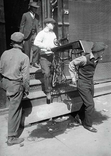 NEW YORK: HOBOS, 1915. Hobos moving Hotel de Gink, a hotel for itinerant workers