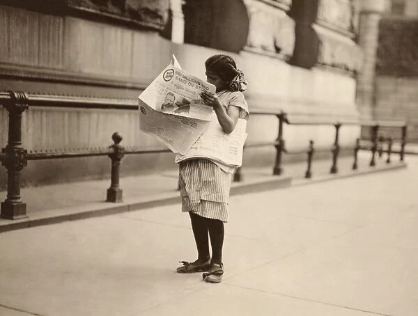 NEW YORK: NEWSGIRL, 1910. A newsgirl on Park Row in New York City