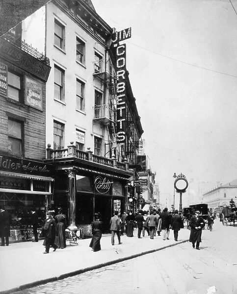 NEW YORK STREET, c1900. Gentleman Jim Corbetts saloon in New York, c1900