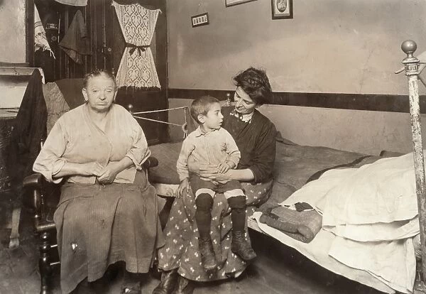NEW YORK: TENEMENT, 1913. Hyman Bachwald, an epileptic, with his mentally ill mother