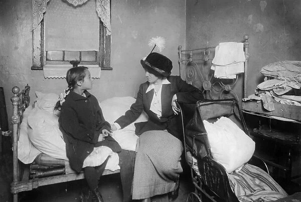NEW YORK: TENEMENT, 1913. Investigator talking with Ida List, eight year old child
