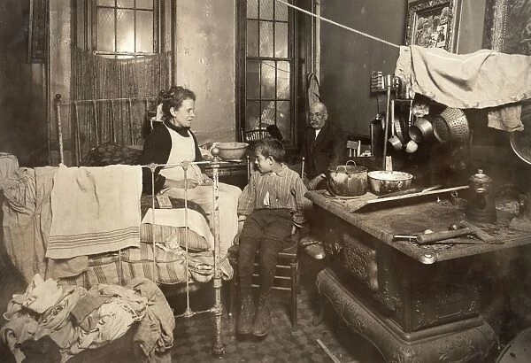 NEW YORK: TENEMENT, 1913. Jimmie Chinquanana, in his home in the rear of their