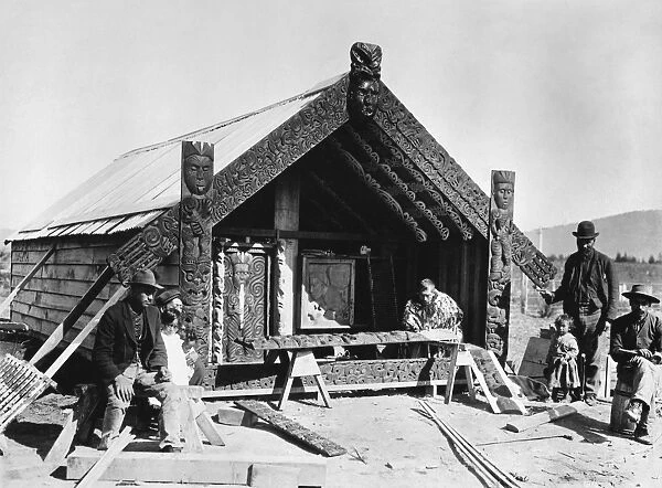 NEW ZEALAND, c1910. Maori men building a meeting house in New Zealand. Photograph