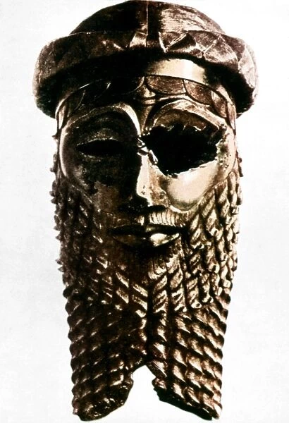 NINEVEH: BRONZE HEAD. Akkadian bronze head from Nineveh, c2350 B. C. perhaps that of King Sargon