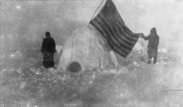 NORTH POLE: IGLOO, c1909. Two members of Frederick Cooks journey expedition at