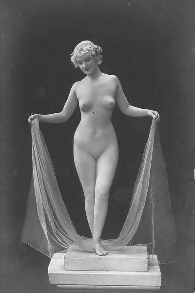 NUDE POSING, 1920s. Olga Desmond (1891-1964) posing as living statuary