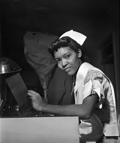 NURSE, 1942. Student nurse Lydia Monroe at Provident Hospital in Chicago, Illinois