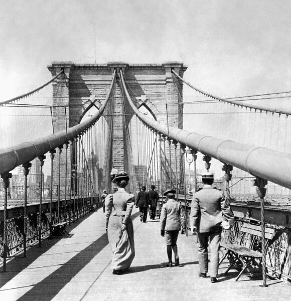 NY: BROOKLYN BRIDGE, 1899. On the pedestrian promenade of the Brooklyn Bridge. Photograph, from a stereograph view, c1899