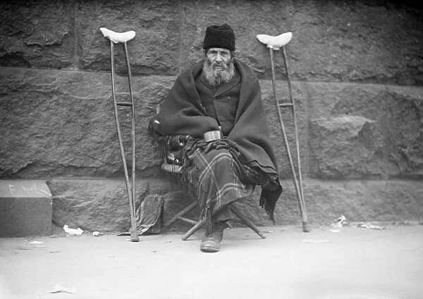 NYC: BEGGAR, 1922. A man begging in New York City. Photograph, 1922