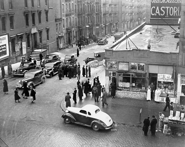 NYC: DRUG RAID, 1939. Treasury agents blockade a street with their cars before