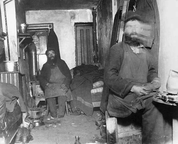 NYC: TENEMENT LIFE. Interior of tenement housing in New York City. Photograph by Jacob Riis