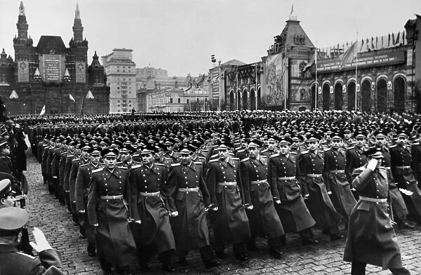 Officers of the Moscow Garrison pass before the reviewing stand in the Red Square in Moscow, during a parade celebrating the 40th anniversary of the October Revolution, 7 November 1957