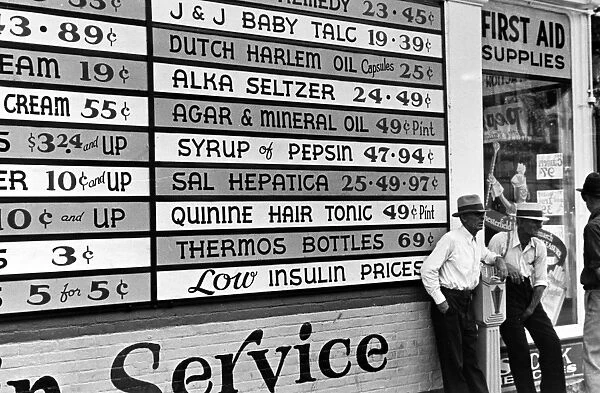OHIO: DRUGSTORE, 1938. Sign outside a drugstore at Newark, Ohio. Photographed by Ben Shahn