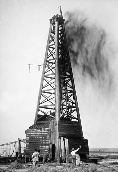 Oil derrick in a oil field in rural Oklahoma. Photograph, c1922